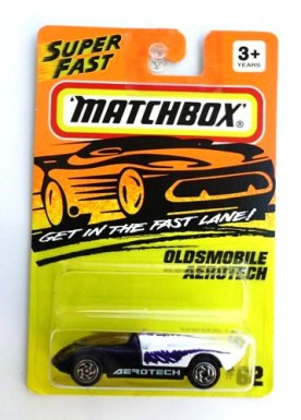 (62) Oldsmobile Areotech (Areotech L - Copy Oldsmobile Areotech- “Card! #62-Purple/White w/Silver Wheels & Areotech Tampo” (Matchbox 75 “Tyco Fast Lane” Collectible Series) “Rare-Vintage” (1994)