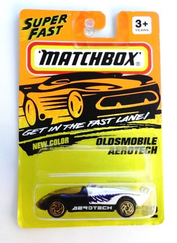 (62) Oldsmobile Areotech (Areotech Logo-Gold Wheels) 1993 Oldsmobile Areotech -Gold Wheels Variant “Card! #62-Purple & White w/Areotech Tampo” (Matchbox 75 “Tyco Fast Lane” Collectible Series) “Rare-Vintage” (1993)