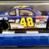 2002 Chevy Monte Carlo #48 Jimmie Johnson Lowe's Looney Tunes Rematch-(B)